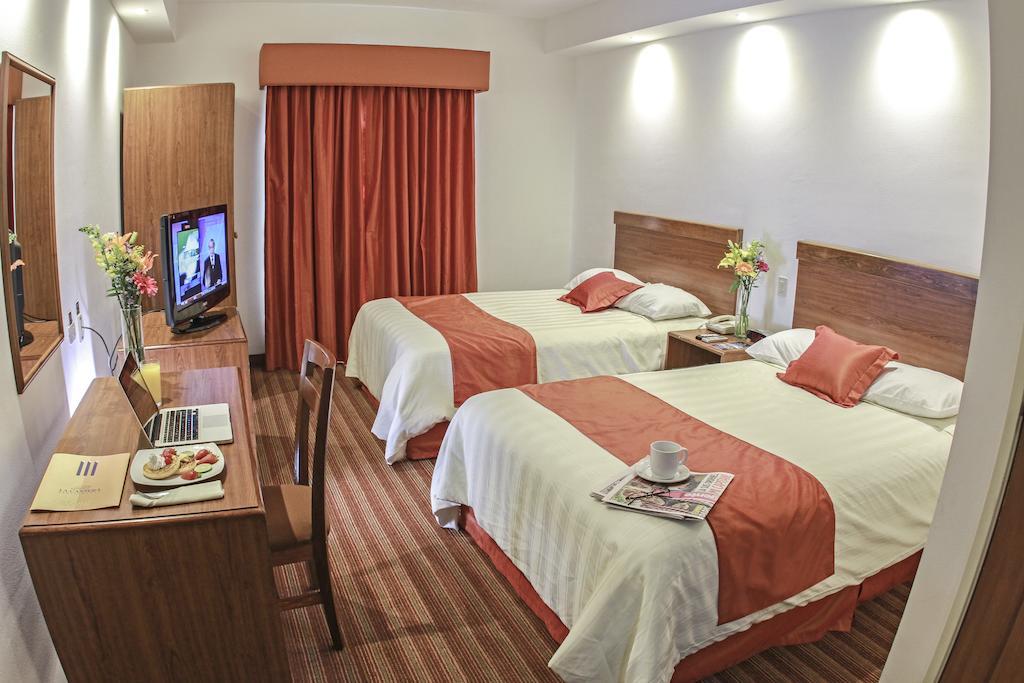 Wyndham Garden Monterrey Valle Real Room photo